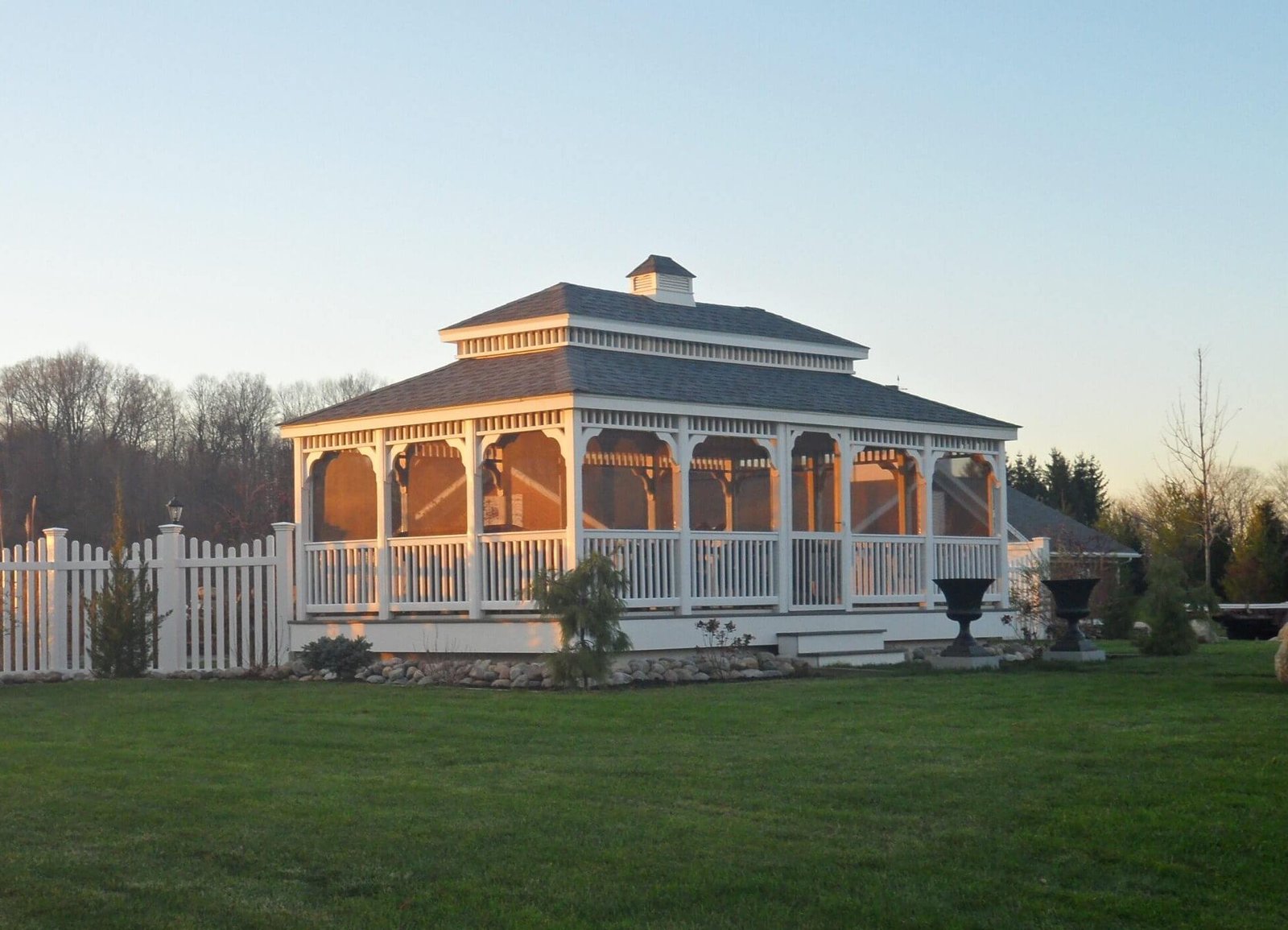 Large white vinyl rectangle gazebo with double cupola and decorative posts