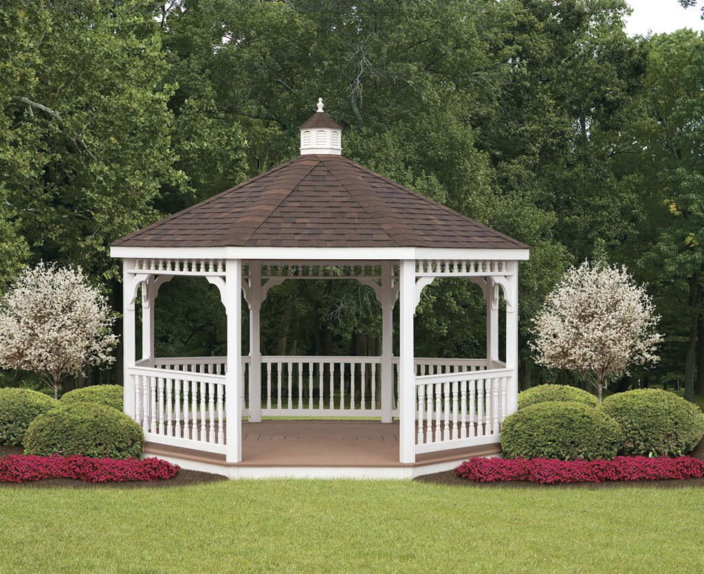 White vinyl gazebo with cupola in a garden