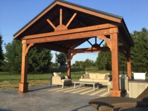 Pine Pavilion with large trusses and decorative posts and metal roofing